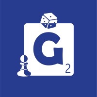 Graphic of Game Genius logo shows a ''G'' in a die with a die graphic on top, a chess piece to the left, and a two to the bottom right..